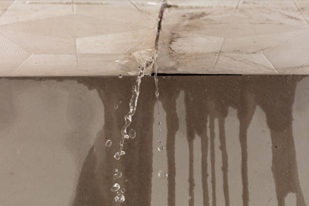 Professional Flood Damage Cleanup technician working in Bowdoin, ME